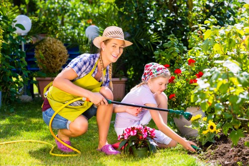 Residential garden landscaping with lawn and borders in Hendon